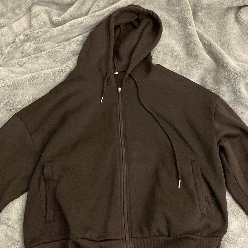 Exclusive Black Zip-up. Highly comfortable made of thick material.